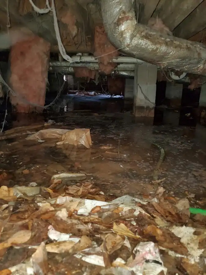 Crawl space flood assessment for Commercial Water Damage Restoration in Fuquay