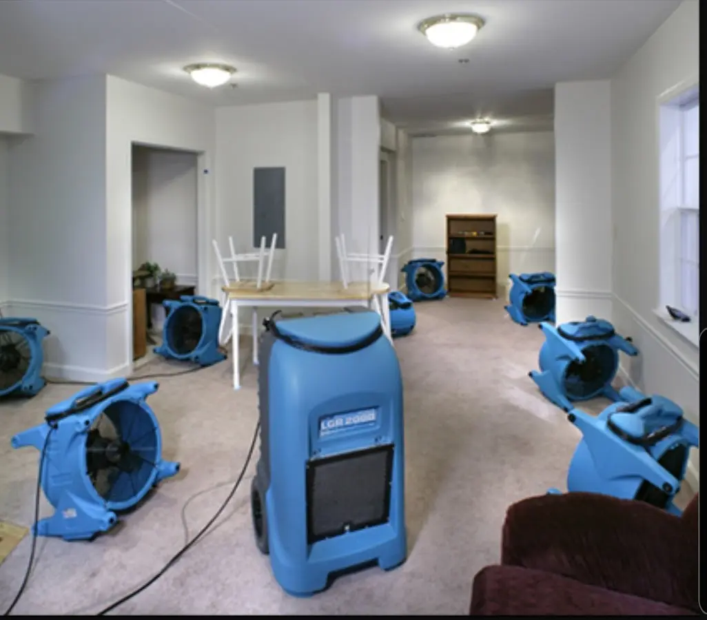 Air movers and dehumidifier setup for Water Extraction & Removal in Fuquay